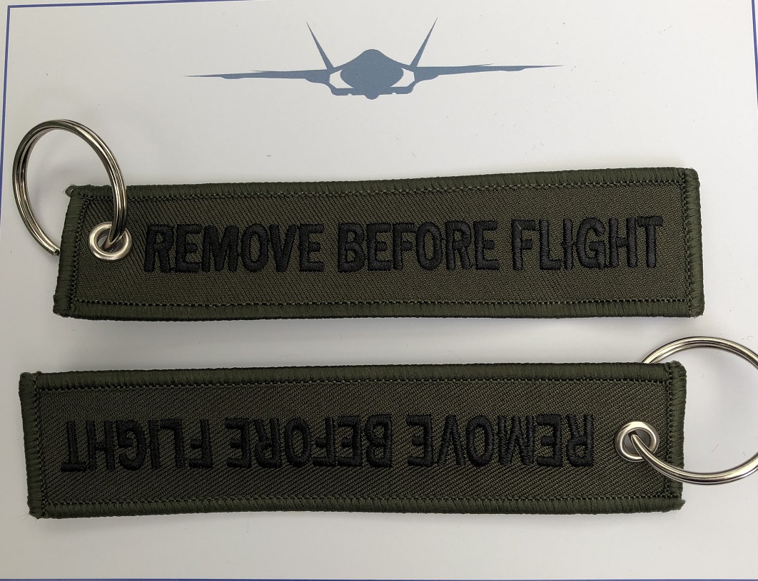 Greece AEGEAN Airlines *Remove Before Flight* Fabric Keychain New and Sealed 