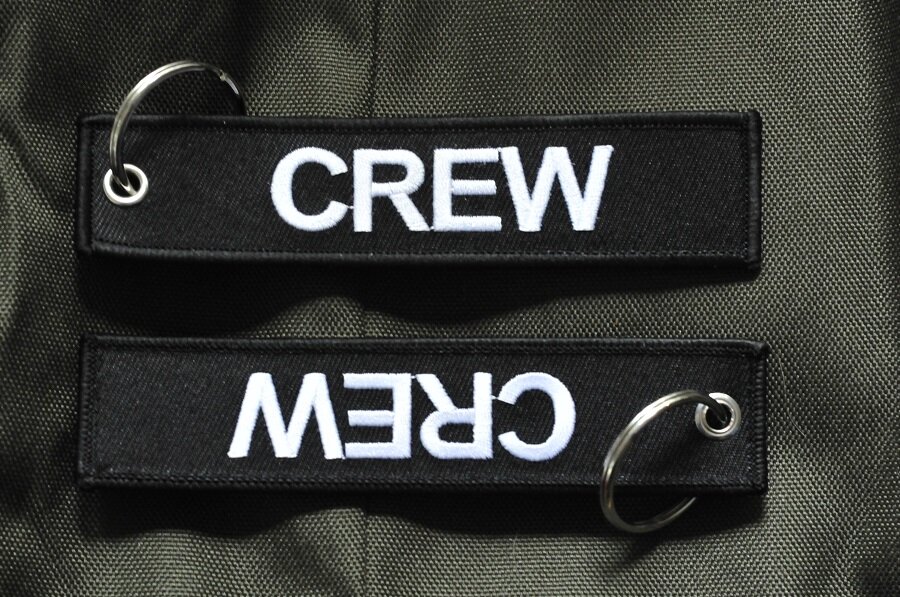 CREW embroidered keychain keyring bagagelabel color black