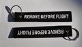 Remove before flight keychain (black color), key ring, luggage tag 