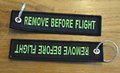 REMOVE BEFORE FLIGHT keychain keyring (black + green letters)