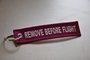 REMOVE BEFORE FLIGHT keychain keyring (pink + white letters)_