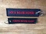 REMOVE BEFORE FLIGHT embroidered keyring keychain  color black & red letters_