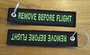 REMOVE BEFORE FLIGHT keychain keyring (black + green letters)_