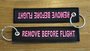 REMOVE BEFORE FLIGHT keychain keyring (black + pink letters)_